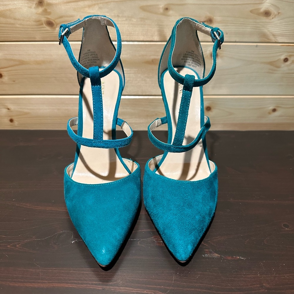 Brand new Nine West teal pumps in size 6.